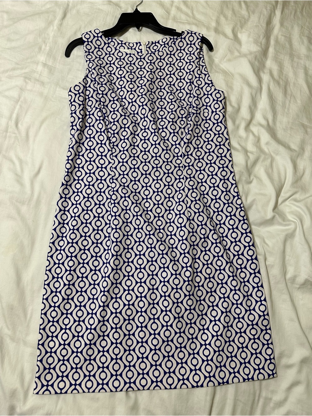 Sleeveless White Midi Dress with Navy Geometric Print